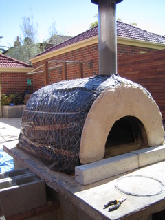 Place the oven concrete arches on