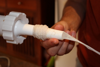 Push the casing onto the sausage nozzle