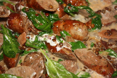 Braised sausages with puy/bondi lentils